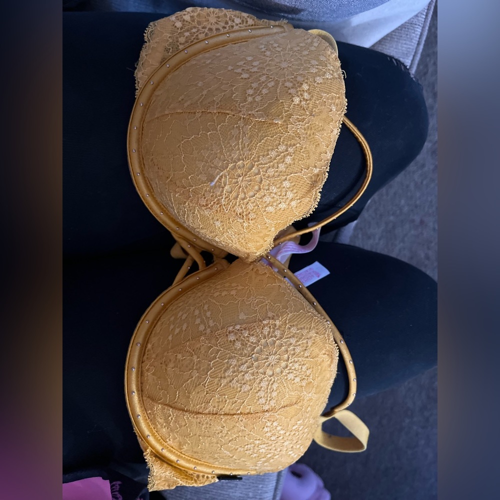 Yellow bra has gems that crisscross across the chest super cute size 36C